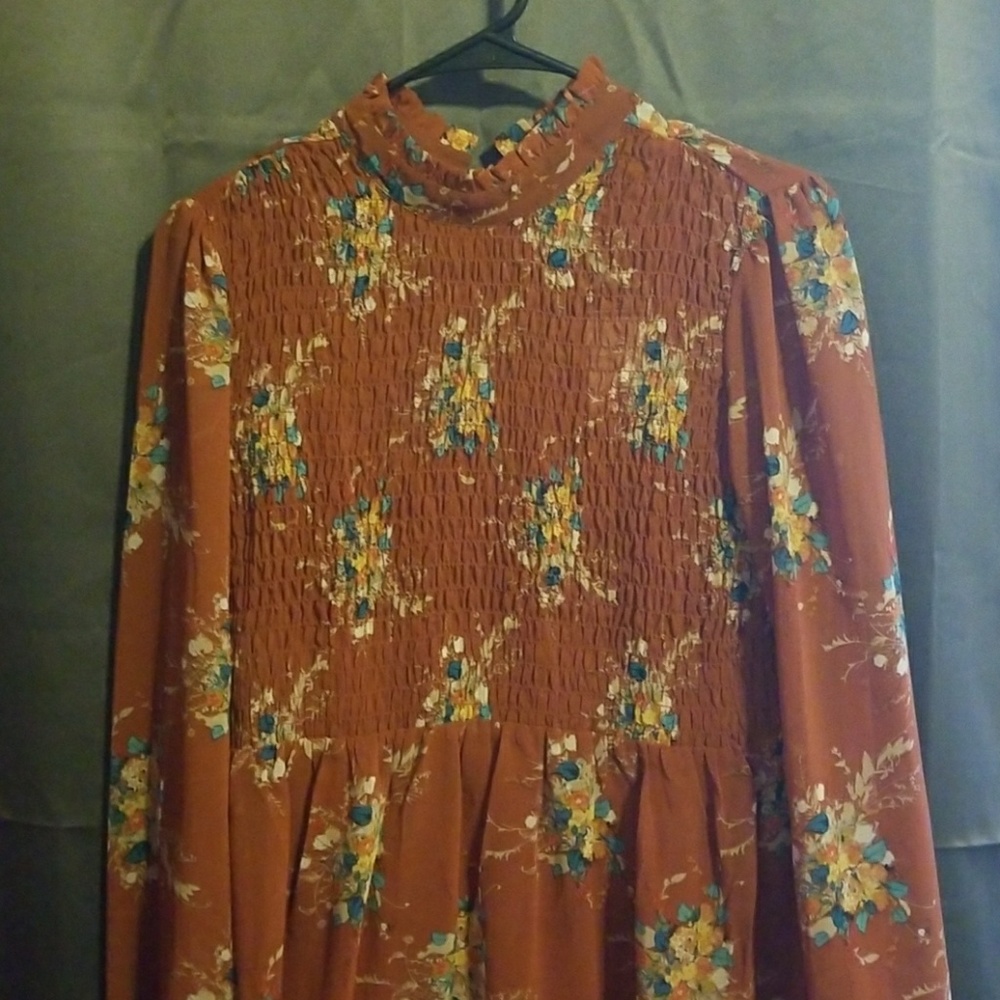 New dress. Rust in color with floral print